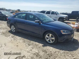 2013 Volkswagen Jetta TDI w/Premium с VIN 3VWLL7AJ1DM408026, выставлен на аукционе Copart как лот 51115825 с пробегом 98 586 миль миль и Списание • Salvage title. История ставок и продаж доступна на DreamBid. Изображение 4.