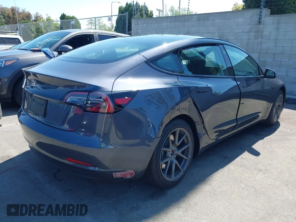 2023 Tesla Model 3 z VIN 5YJ3E1EAXPF710024, wystawiony jako IAAI lot #41228608 z przebiegiem 10 481 mil mil oraz . Historia ofert i sprzedaży dostępna na DreamBid. Obrazek 4.