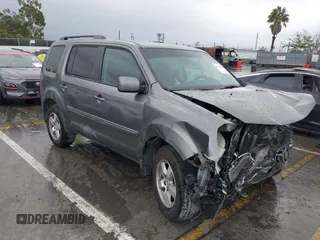 2011 Honda Pilot EX with VIN 5FNYF3H49BB026174, listed as a IAAI auction lot 41795460 with 201,488 mi miles and . Bid and sale history available at carsss.com. Image 1.