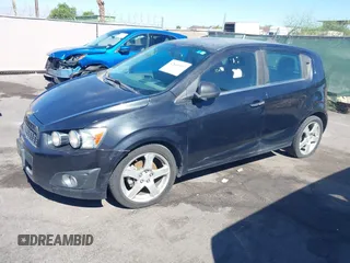 2015 Chevrolet Sonic LTZ with VIN 1G1JE6SB8F4116693, listed as a IAAI auction lot 42865997 with 102,961 mi miles and . Bid and sale history available at DreamBid. Image 6.
