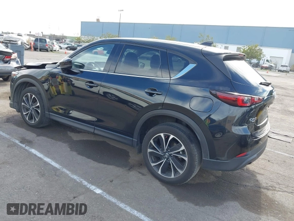 2023 Mazda CX-5 2.5 S Premium Package with VIN JM3KFBDM4P0266378, listed as a IAAI auction lot 41655712 with 31,746 mi miles. Bid and sale history available at carsss.com. Image 3.