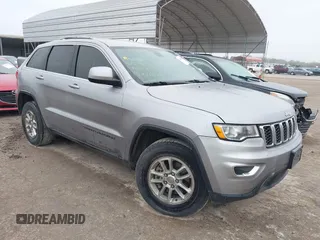 2018 Jeep Grand Cherokee Laredo E with VIN 1C4RJEAG8JC382825, listed as a IAAI auction lot 41288056 with 105,652 mi miles. Bid and sale history available at carsss.com. Image 1.