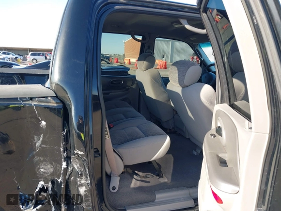 2002 Ford F-150 XLT with VIN 1FTRW07622KD31203, listed as a IAAI auction lot 41401506 with 166,949 mi miles. Bid and sale history available at carsss.com. Image 8.