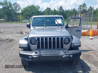 2021 Jeep Wrangler Unlimited Sahara with VIN 1C4HJXEN3MW628845, listed as a IAAI auction lot 42438049 with 49,970 mi miles and . Bid and sale history available at DreamBid. Image 12.