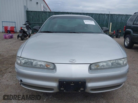2002 Oldsmobile Intrigue GX z VIN 1G3WH52H22F149397, wystawiony jako IAAI lot #42265108 z przebiegiem 107 834 mil mil oraz . Historia ofert i sprzedaży dostępna na DreamBid. Obrazek 6.