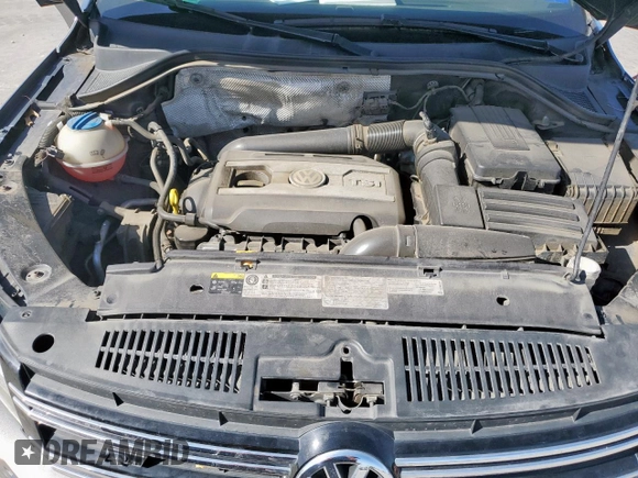2014 Volkswagen Tiguan SEL z VIN WVGAV3AX6EW030705, wystawiony jako Copart lot #52156805 z przebiegiem 142 377 mil mil oraz Szkoda całkowita • Salvage title. Historia ofert i sprzedaży dostępna na DreamBid. Obrazek 12.