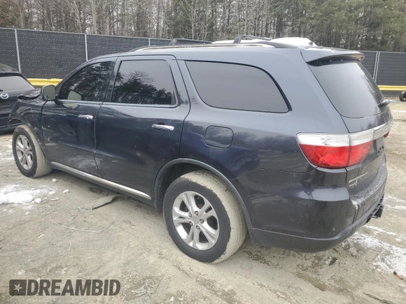 2013 Dodge Durango Crew with VIN 1C4SDJDT9DC538529, listed as a Copart auction lot 88201115 with 142,753 mi miles and Salvage title. Bid and sale history available at DreamBid. Image 2.