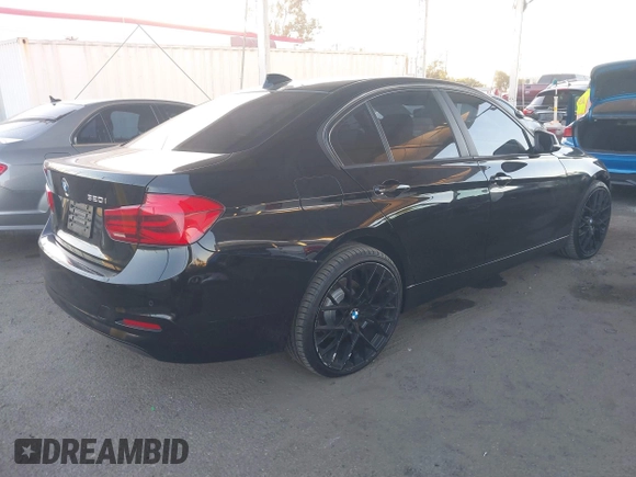 2018 BMW 3 Series 320i with VIN WBA8E1G54JNU91167, listed as a IAAI auction lot 40891360 with 93,976 mi miles. Bid and sale history available at carsss.com. Image 4.