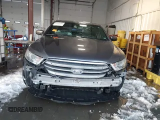 2013 Ford Taurus SEL z VIN 1FAHP2E89DG150197, wystawiony jako IAAI lot #41214999 z przebiegiem 146 307 mil mil oraz . Historia ofert i sprzedaży dostępna na DreamBid. Obrazek 13.