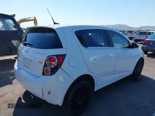 2012 Chevrolet Sonic LT with VIN 1G1JC6SB4C4214346, listed as a IAAI auction lot 40296983 with 116,014 mi miles. Bid and sale history available at carsss.com. Image 4.