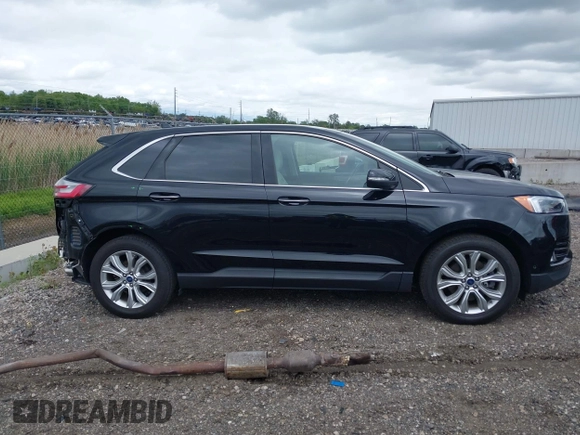 2020 Ford Edge Titanium with VIN 2FMPK4K94LBA22657, listed as a IAAI auction lot 42340706 with 62,857 mi miles and . Bid and sale history available at DreamBid. Image 14.