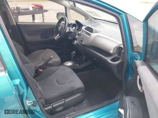 2013 Honda Fit with VIN JHMGE8H3XDC047486, listed as a IAAI auction lot 41543068 with 73,414 mi miles. Bid and sale history available at carsss.com. Image 5.