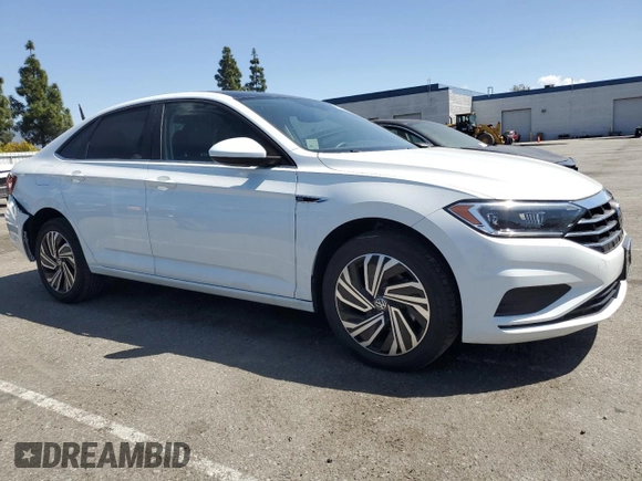 2021 Volkswagen Jetta SEL with VIN 3VWE57BU9MM082391, listed as a Copart auction lot 51993815 with 22,589 mi miles and Salvage title. Bid and sale history available at DreamBid. Image 4.