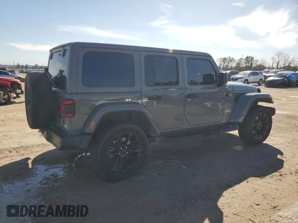 2023 Jeep Wrangler Sahara with VIN 1C4JJXP61PW505122, listed as a Copart auction lot 46719615 with 28,691 mi miles and Salvage Title. Bid and sale history available at DreamBid. Image 3.