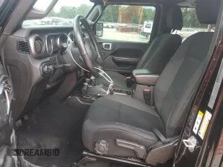 2019 Jeep Wrangler Unlimited Sport S with VIN 1C4HJXDG4KW641619, listed as a Copart auction lot 62551685 with 69,731 mi miles and Non repairable. Bid and sale history available at DreamBid. Image 7.
