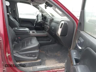 2019 GMC Sierra 2500HD Denali with VIN 1GT12SEYXKF218861, listed as a IAAI auction lot 41176336 with 130,225 mi miles. Bid and sale history available at carsss.com. Image 5.