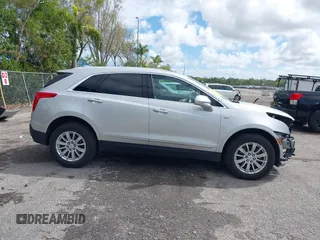 2019 Cadillac XT5 FWD z VIN 1GYKNARSXKZ242727, wystawiony jako IAAI lot #41669220 z przebiegiem 62 812 mil mil oraz . Historia ofert i sprzedaży dostępna na DreamBid. Obrazek 13.