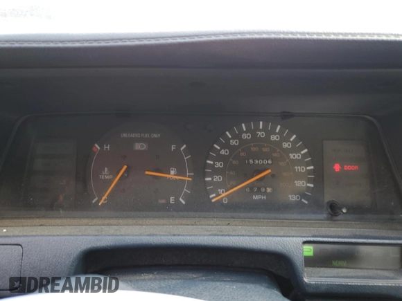1990 Toyota Camry DLX z VIN 4T1SV21E8LU165609, wystawiony jako Copart lot #79314534 z przebiegiem 153 006 mil mil oraz Szkoda całkowita • Salvage title. Historia ofert i sprzedaży dostępna na DreamBid. Obrazek 9.