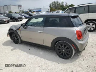 2018 MINI Hardtop Cooper with VIN WMWXP5C56J2H29012, listed as a Copart auction lot 50571595 with 77,129 mi miles and Salvage title. Bid and sale history available at DreamBid. Image 2.