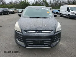 2013 Ford Escape SEL with VIN 1FMCU9H92DUA86916, listed as a Copart auction lot 63516415 with 167,791 mi miles and Salvage title. Bid and sale history available at DreamBid. Image 5.