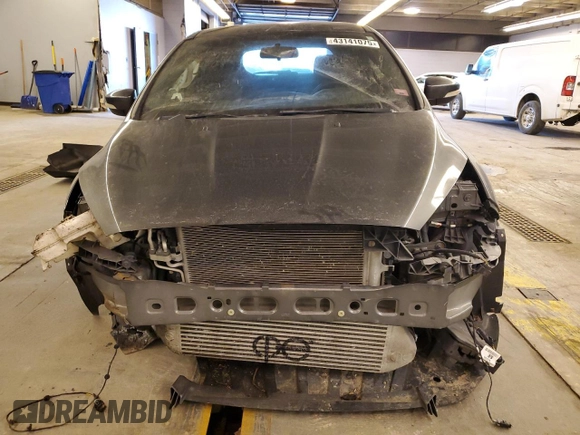 2018 Ford Focus ST with VIN 1FADP3L99JL282007, listed as a Copart auction lot 43141075 with 57,495 mi miles and Salvage Title. Bid and sale history available at DreamBid. Image 5.