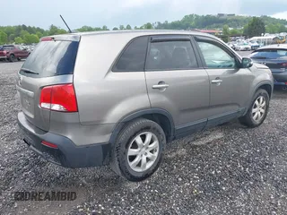 2011 Kia Sorento LX with VIN 5XYKTCA17BG023751, listed as a IAAI auction lot 42176584 with 173,072 mi miles and . Bid and sale history available at DreamBid. Image 4.