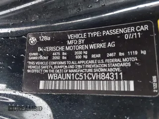 2012 BMW 1 Series 128i with VIN WBAUN1C51CVH84311, listed as a IAAI auction lot 41551912 with 147,052 mi miles and . Bid and sale history available at DreamBid. Image 9.
