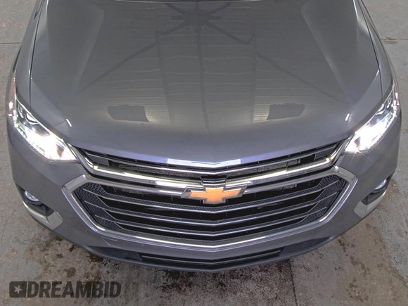 2021 Chevrolet Traverse LT Cloth z VIN 1GNEVGKW8MJ192048, wystawiony jako IAAI lot #42556137 z przebiegiem 106 304 mil mil oraz . Historia ofert i sprzedaży dostępna na DreamBid. Obrazek 8.
