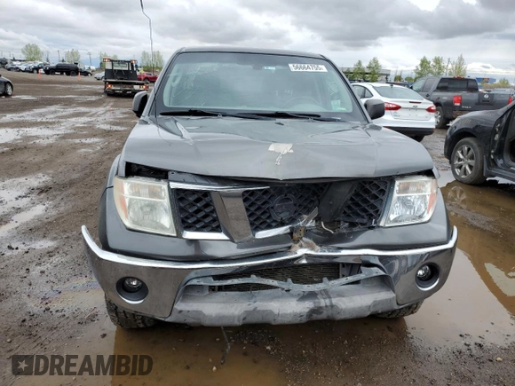 2008 Nissan Frontier LE with VIN 1N6AD09W58C411210, listed as a Copart auction lot 56664755 with 286,386 mi miles and Salvage title. Bid and sale history available at DreamBid. Image 5.