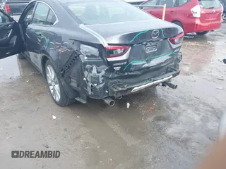 2017 Mazda Mazda6 Touring with VIN JM1GL1V5XH1135153, listed as a IAAI auction lot 41666876 with 71,674 mi miles. Bid and sale history available at carsss.com. Image 6.