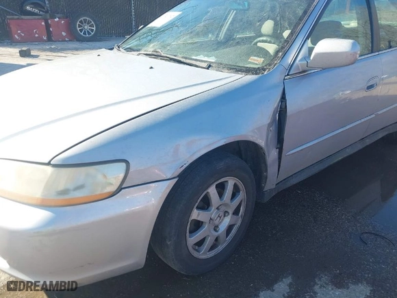 2002 Honda Accord Sdn SE with VIN 1HGCG66822A126206, listed as a IAAI auction lot 41741792 with 232,047 mi miles. Bid and sale history available at carsss.com. Image 6.