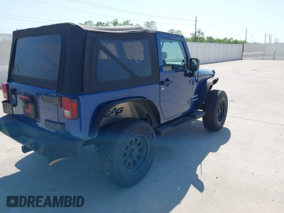2010 Jeep Wrangler Sport with VIN 1J4AA2D11AL117404, listed as a IAAI auction lot 42012340 with 266,310 mi miles and . Bid and sale history available at carsss.com. Image 4.