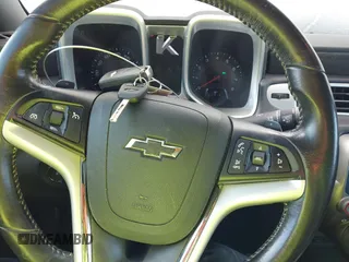 2014 Chevrolet Camaro LT z VIN 2G1FB1E35E9134246, wystawiony jako IAAI lot #41623733 z przebiegiem 171 444 mil mil oraz . Historia ofert i sprzedaży dostępna na DreamBid. Obrazek 11.