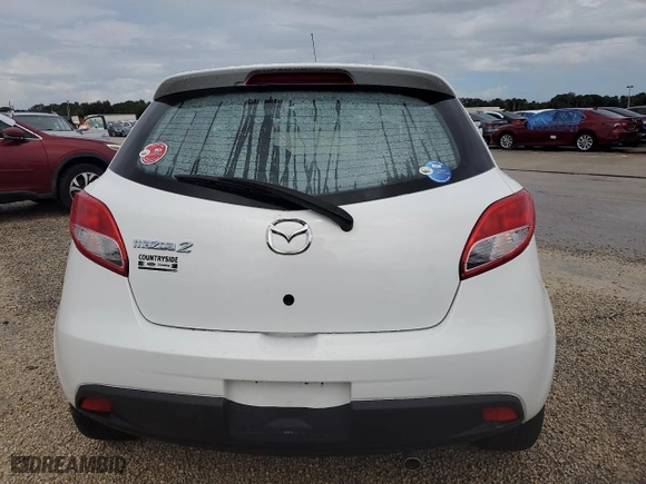 2012 Mazda Mazda2 Touring with VIN JM1DE1LY8C0137590, listed as a Copart auction lot 74488974 with 0 mi miles and Salvage Title. Bid and sale history available at carsss.com. Image 6.