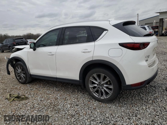 2021 Mazda CX-5 Grand Touring with VIN JM3KFBDM2M1436789, listed as a Copart auction lot 49534305 with 65,790 mi miles and Salvage Title. Bid and sale history available at carsss.com. Image 2.