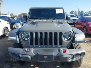 2020 Jeep Gladiator Rubicon with VIN 1C6JJTBG6LL149469, listed as a IAAI auction lot 42224826 with 58,870 mi miles and . Bid and sale history available at DreamBid. Image 13.