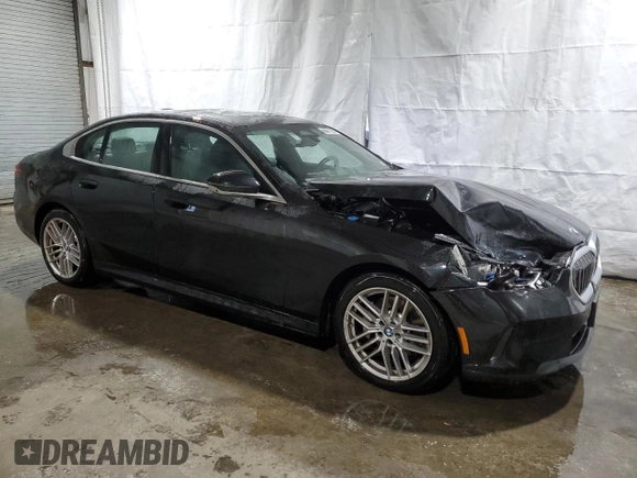 2024 BMW 5 Series 530i xDrive with VIN WBA53FJ07RCR71570, listed as a Copart auction lot 77728914 with 11,597 mi miles and Clean Title. Bid and sale history available at carsss.com. Image 4.