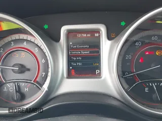 2014 Dodge Journey SXT with VIN 3C4PDCBG9ET209357, listed as a IAAI auction lot 42257467 with 121,786 mi miles and . Bid and sale history available at DreamBid. Image 7.
