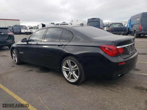2015 BMW 7 Series 740i with VIN WBAYA6C50FGK16616, listed as a Copart auction lot 74849944 with 125,352 mi miles and Salvage Title. Bid and sale history available at carsss.com. Image 2.
