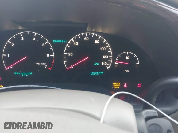 2002 Cadillac DeVille DHS z VIN 1G6KE57Y22U225134, wystawiony jako IAAI lot #41350531 z przebiegiem 126 457 mil mil oraz . Historia ofert i sprzedaży dostępna na DreamBid. Obrazek 7.