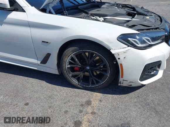2023 BMW 5 Series 530e with VIN WBA13AG09PCM41820, listed as a IAAI auction lot 42409541 with 17,715 mi miles and . Bid and sale history available at DreamBid. Image 6.