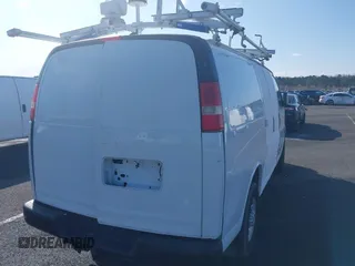 2015 Chevrolet Express Cargo with VIN 1GCWGFCF1F1161498, listed as a IAAI auction lot 41878871 with 157,365 mi miles. Bid and sale history available at carsss.com. Image 4.
