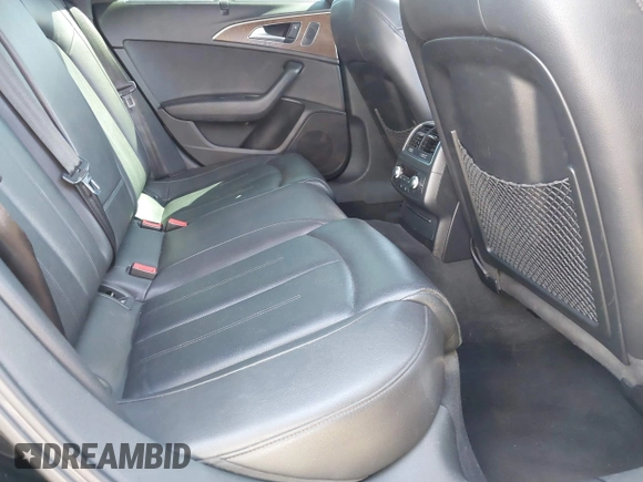 2016 Audi A6 Premium Plus z VIN WAUGFAFC0GN122291, wystawiony jako IAAI lot #42212208 z przebiegiem 106 970 mil mil oraz . Historia ofert i sprzedaży dostępna na DreamBid. Obrazek 8.