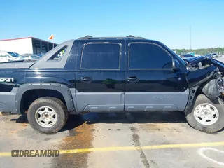 2002 Chevrolet Avalanche with VIN 3GNEK13T42G142319, listed as a IAAI auction lot 41977733 with Not Provided miles and . Bid and sale history available at DreamBid. Image 13.