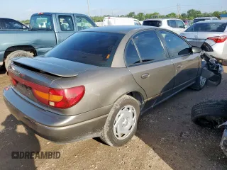 2000 Saturn SL with VIN 1G8ZK5278YZ160430, listed as a Copart auction lot 61234185 with 89,221 mi miles and Salvage title. Bid and sale history available at DreamBid. Image 3.