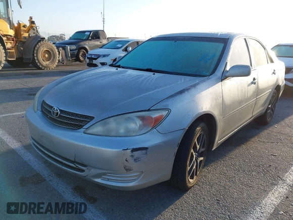 2004 Toyota Camry LE with VIN 4T1BE32K34U307084, listed as a IAAI auction lot 41960265 with 249,222 mi miles. Bid and sale history available at carsss.com. Image 2.