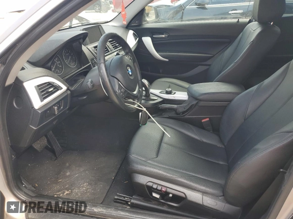 2015 BMW 2 Series 228i with VIN WBA1F5C51FV257605, listed as a Copart auction lot 50991415 with 122,396 mi miles and Salvage Title. Bid and sale history available at carsss.com. Image 7.