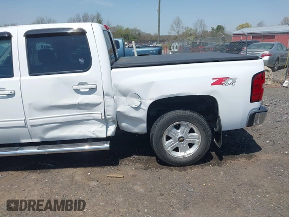2013 Chevrolet Silverado 1500 LTZ with VIN 3GCPKTE24DG123063, listed as a IAAI auction lot 42061675 with 221,813 mi miles and . Bid and sale history available at DreamBid. Image 6.