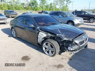 2014 BMW 5 Series 535i with VIN WBA5B1C54ED475113, listed as a IAAI auction lot 42077901 with 145,341 mi miles. Bid and sale history available at carsss.com. Image 1.