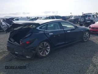 2014 Tesla Model S 60 with VIN 5YJSA1H12EFP53787, listed as a IAAI auction lot 42279493 with 168,859 mi miles and . Bid and sale history available at DreamBid. Image 4.